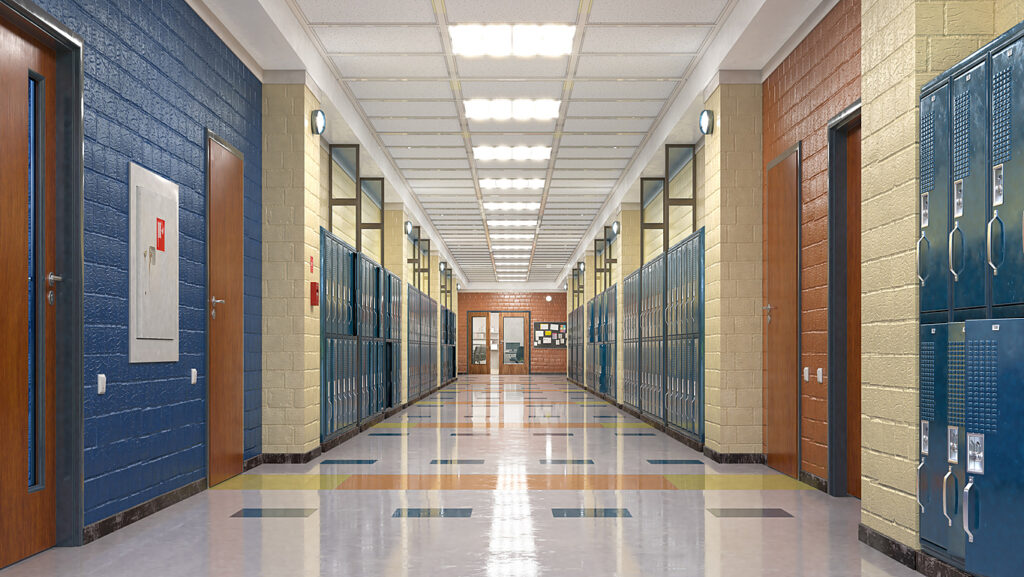 Empty school hallway with lockers on either side
